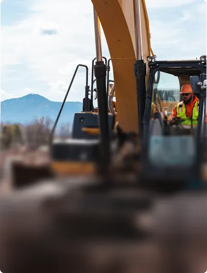 Heavy excavator moving earth
